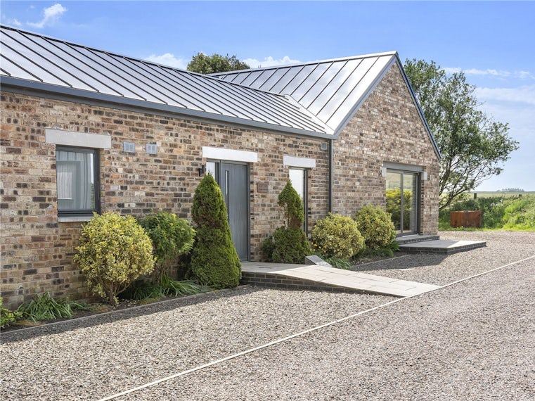 Contemporary stone and zinc house — a current Simpson & Marwick North Berwick listing